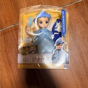 Harry Potters Fluer Delacour Wizarding World Doll with 2 Blue Outfits dmg box
